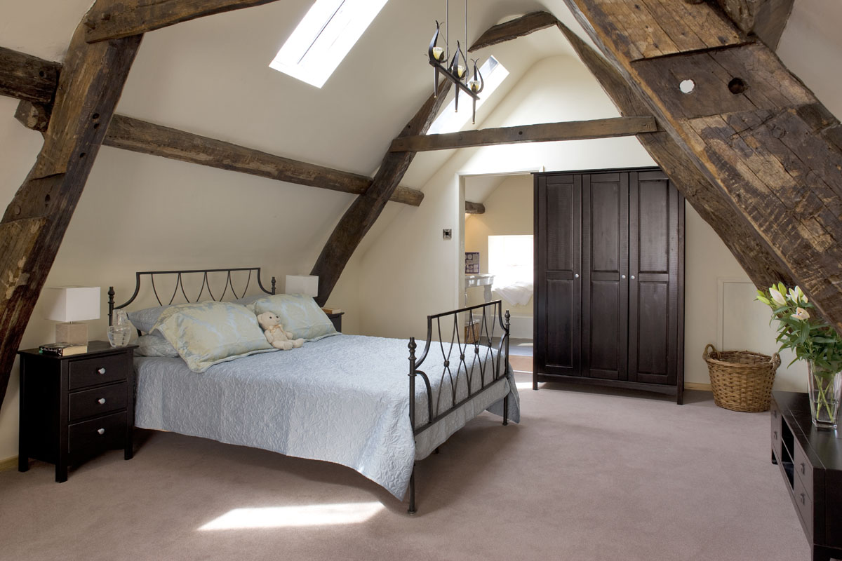 Large loft bedroom with kingsize bed and ensuite bath